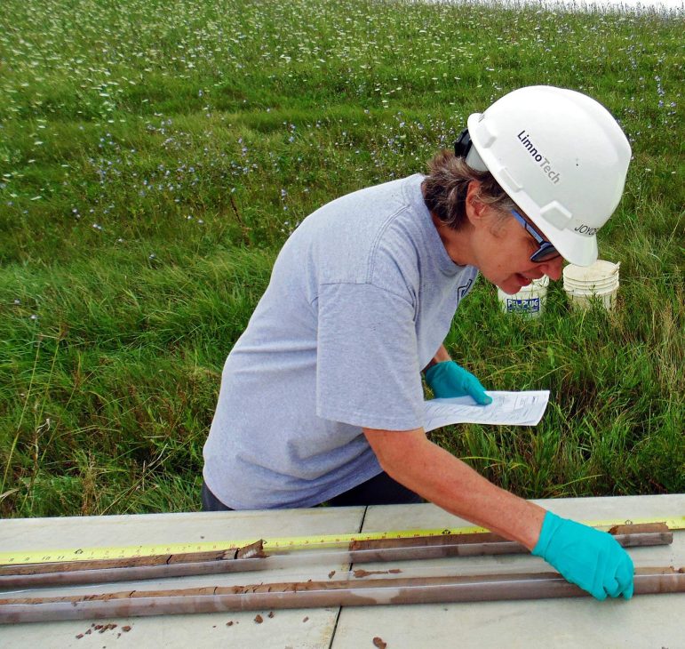 Joyce Dunkin of LimnoTech working with logging cores