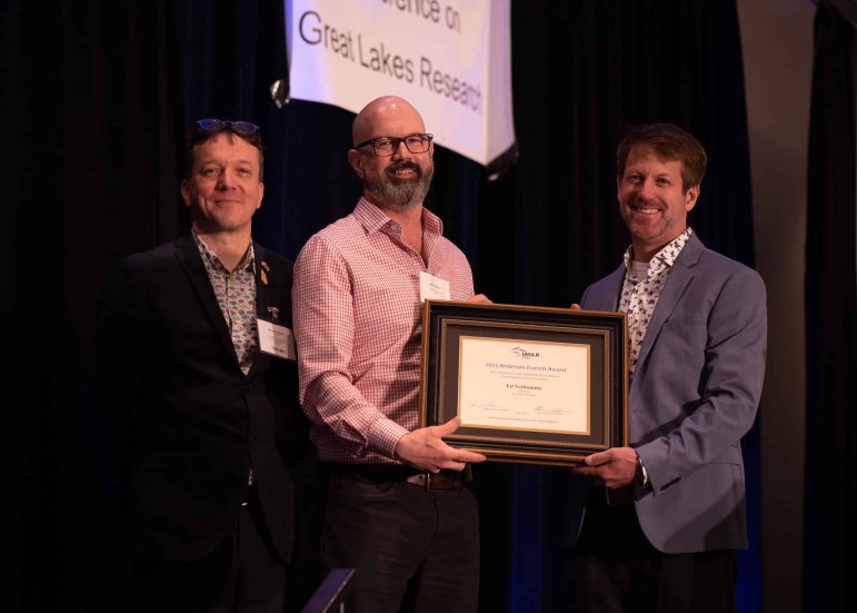 Ed Verhamme (right) was presented with the Anderson-Everett Award award by Neil Rooney, IAGLR President (middle) and Jerome Marty, IAGLR Executive Director (left) during the IAGLR 2023 conference (photo credit: Stephany Hildebrand).