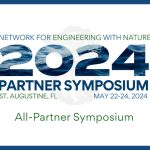 Text on top of a logo that is a tree with roots that states: Network for Engineering with Nature 2024 Partner Symposium, St. Augustine, FL, May 22-24, 2024, All-Partner Symposium. The background is white with the text in blue and green.